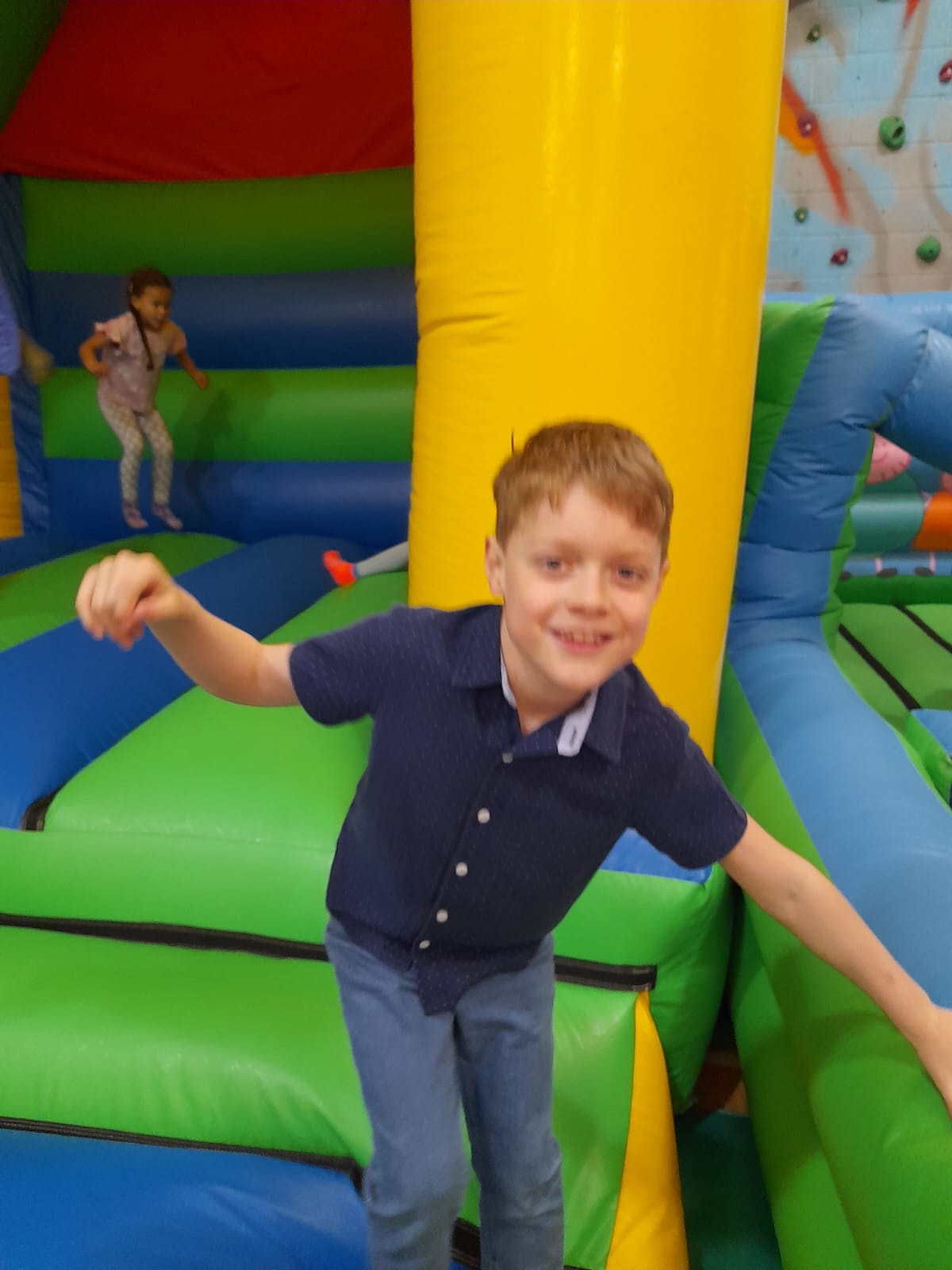 boys playing on bouncy castle