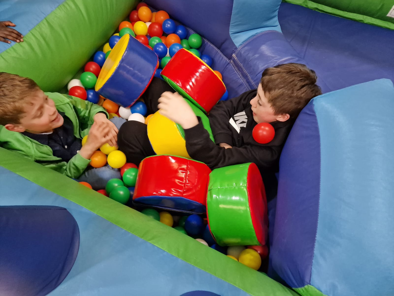 children playing in ball pool