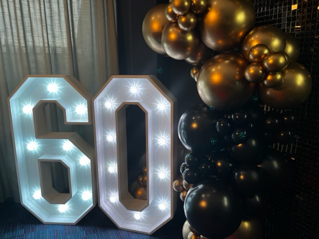 Light up LED number 60 at party in Shrewsbury