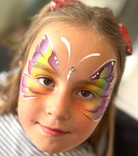 Girl with butterfly face paint
