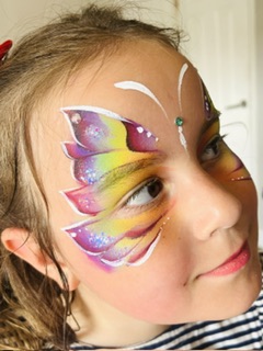 Butterfly face painting on a girl