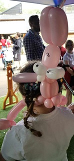 Girl with a bunny balloon hat in Telford