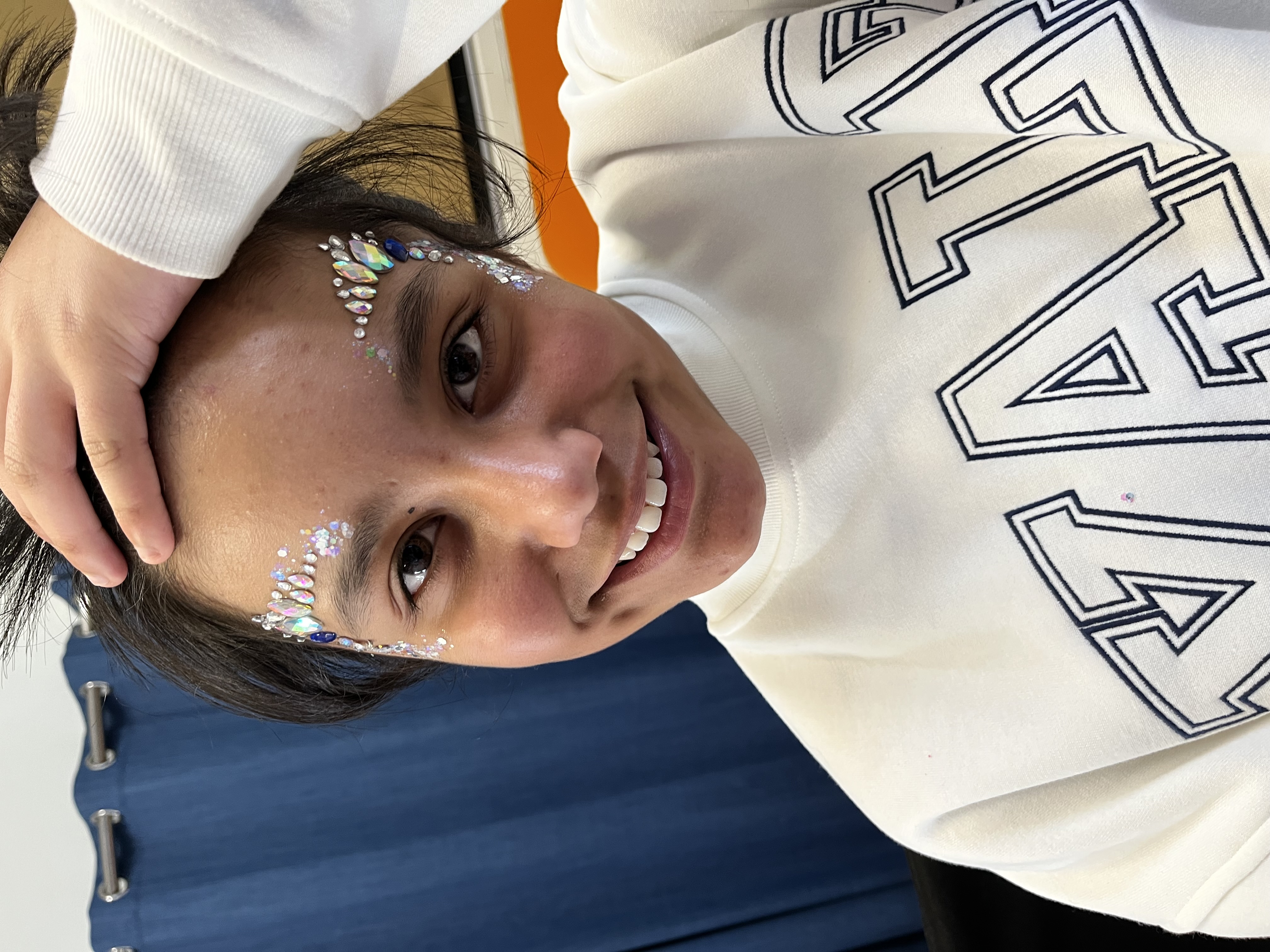 festival gems and glitter on girls face in telford