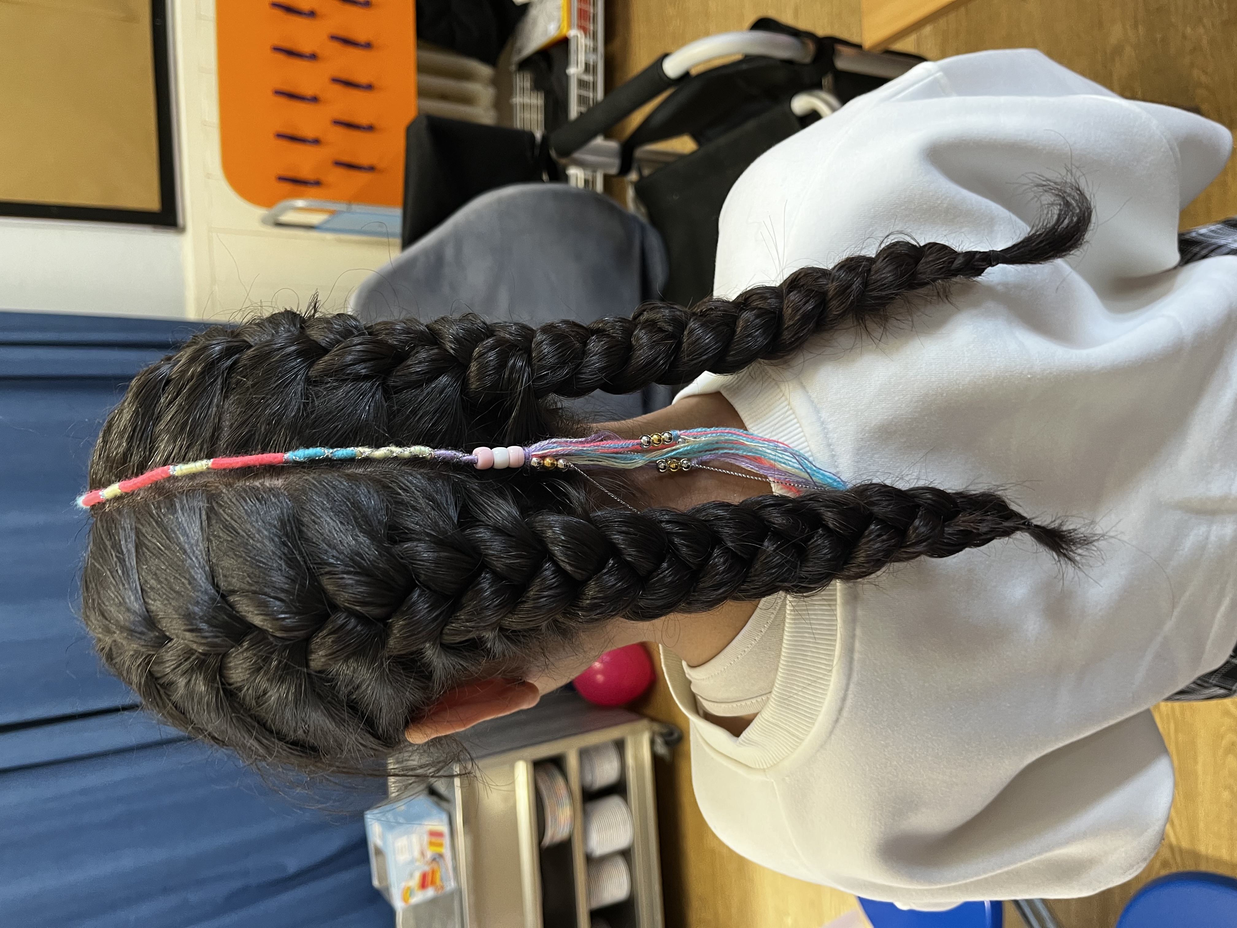 girl with dark hair in french plait with hair braid in telford at a pamper party