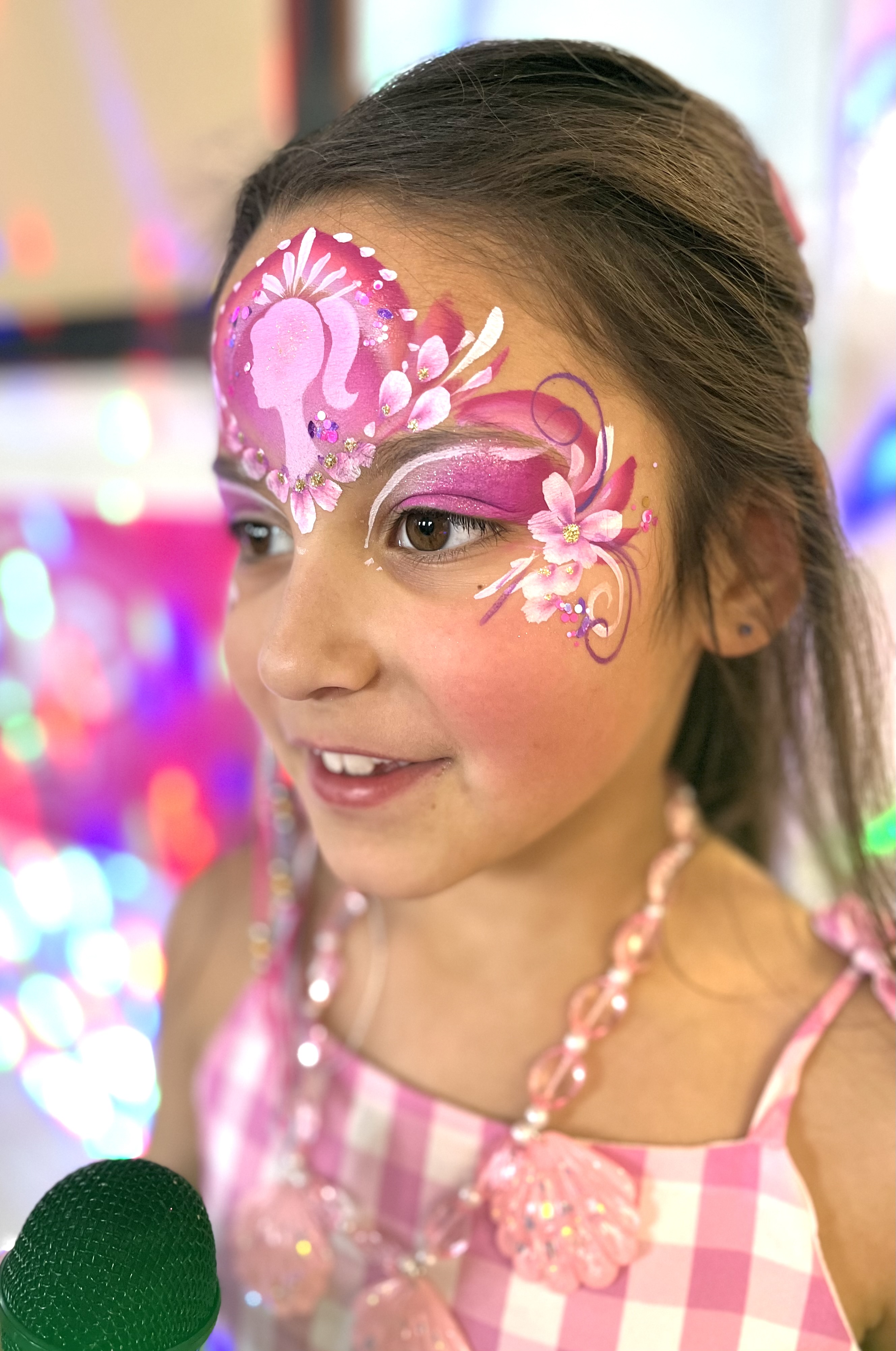 Barble face paint on young girl