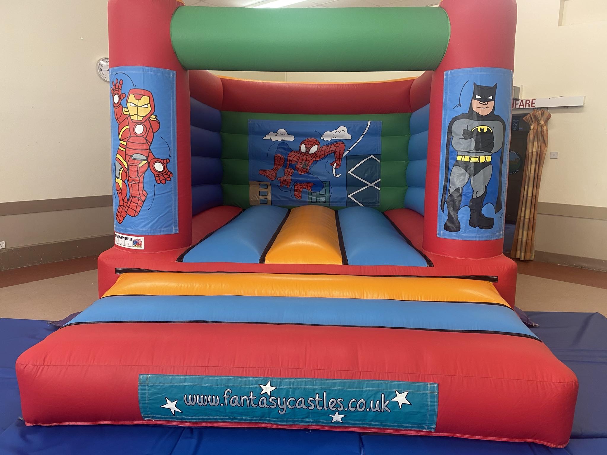 Superhero bouncy castle on hire at a party in Shrewsbury