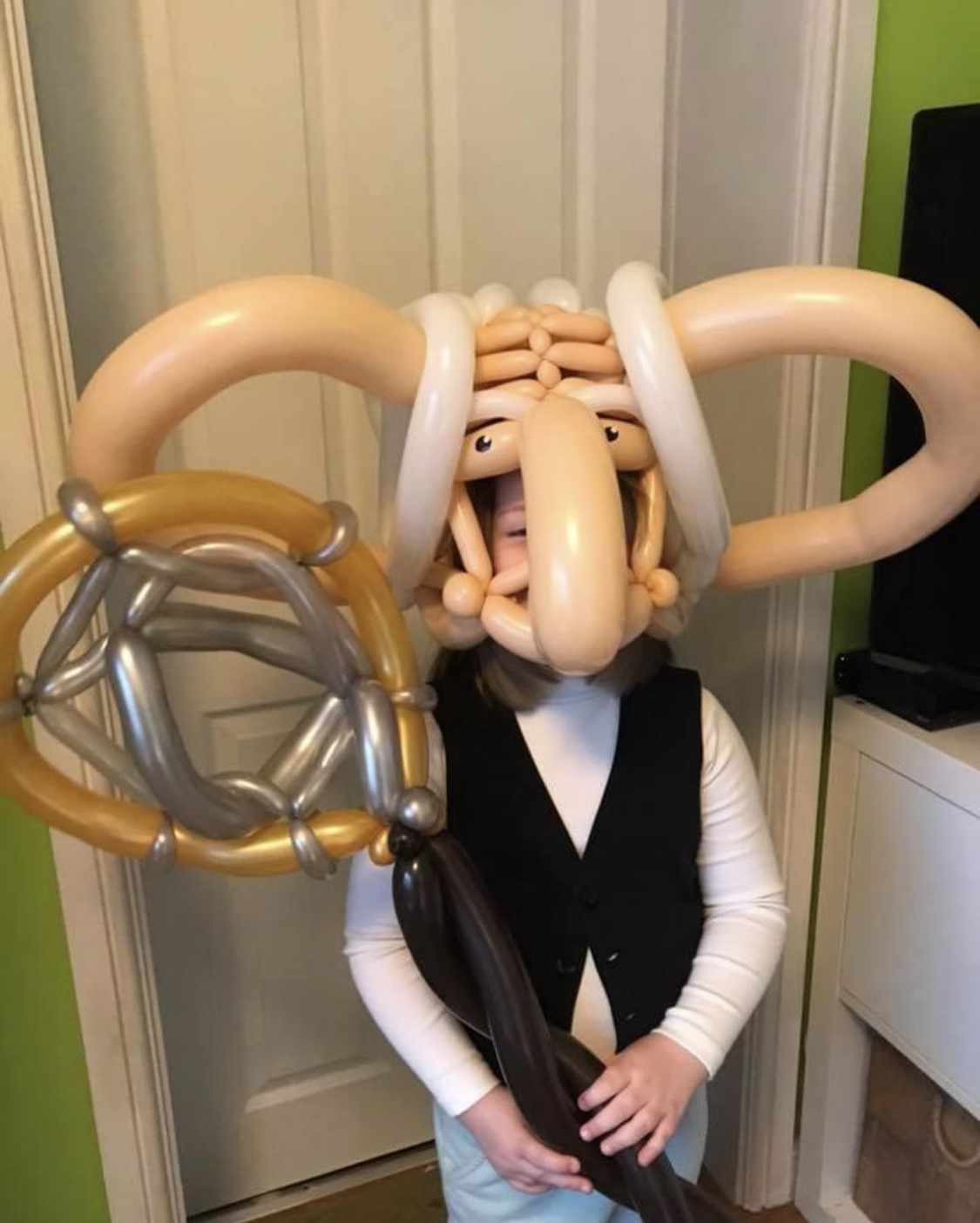 The BFG outfit made from balloons on a girl for world book day