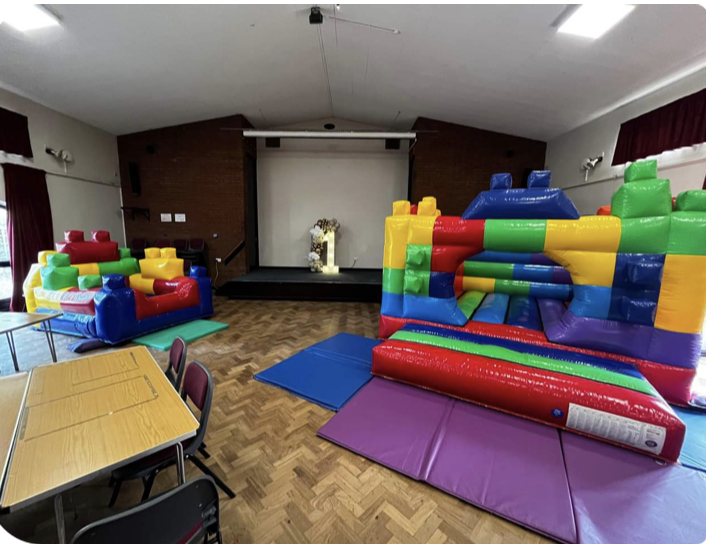 Lego Bouncy Castle on hire ata 1st birthday party in telford