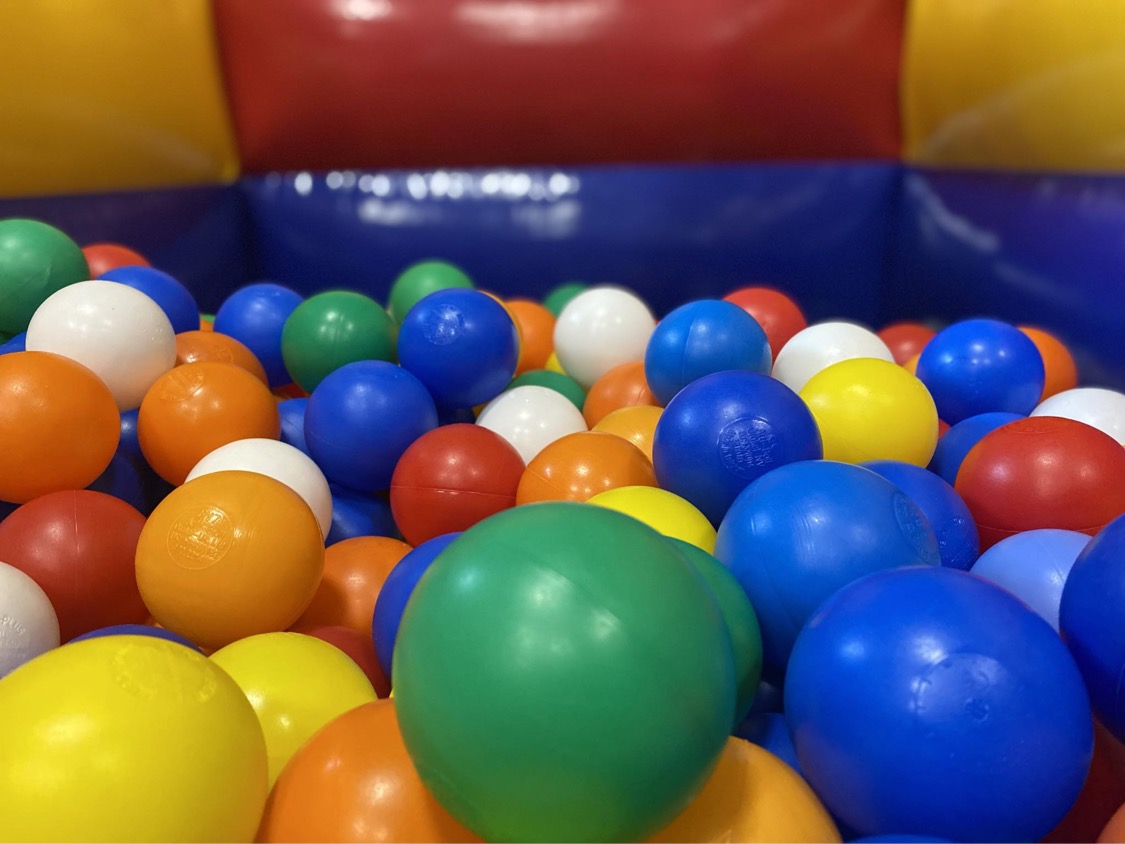 Coloured balls inside a ball pool